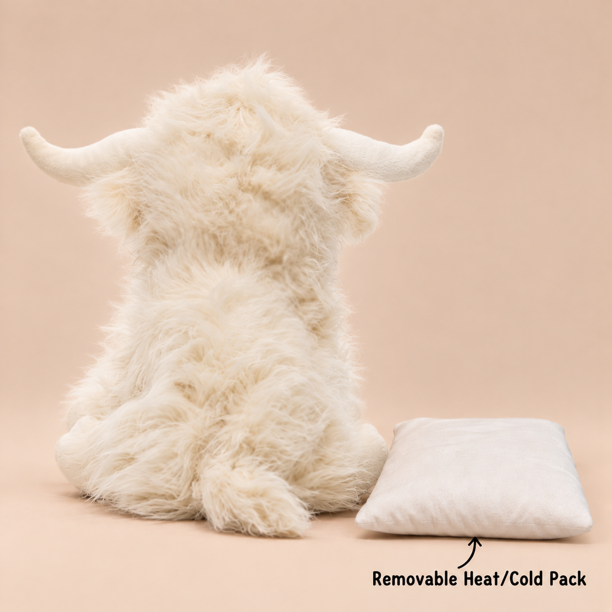 White Highland Cow plush with removable microwavable heat and cold pack