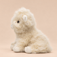 Side view of White Highland Cow weighted stuffed animal by Hugglz